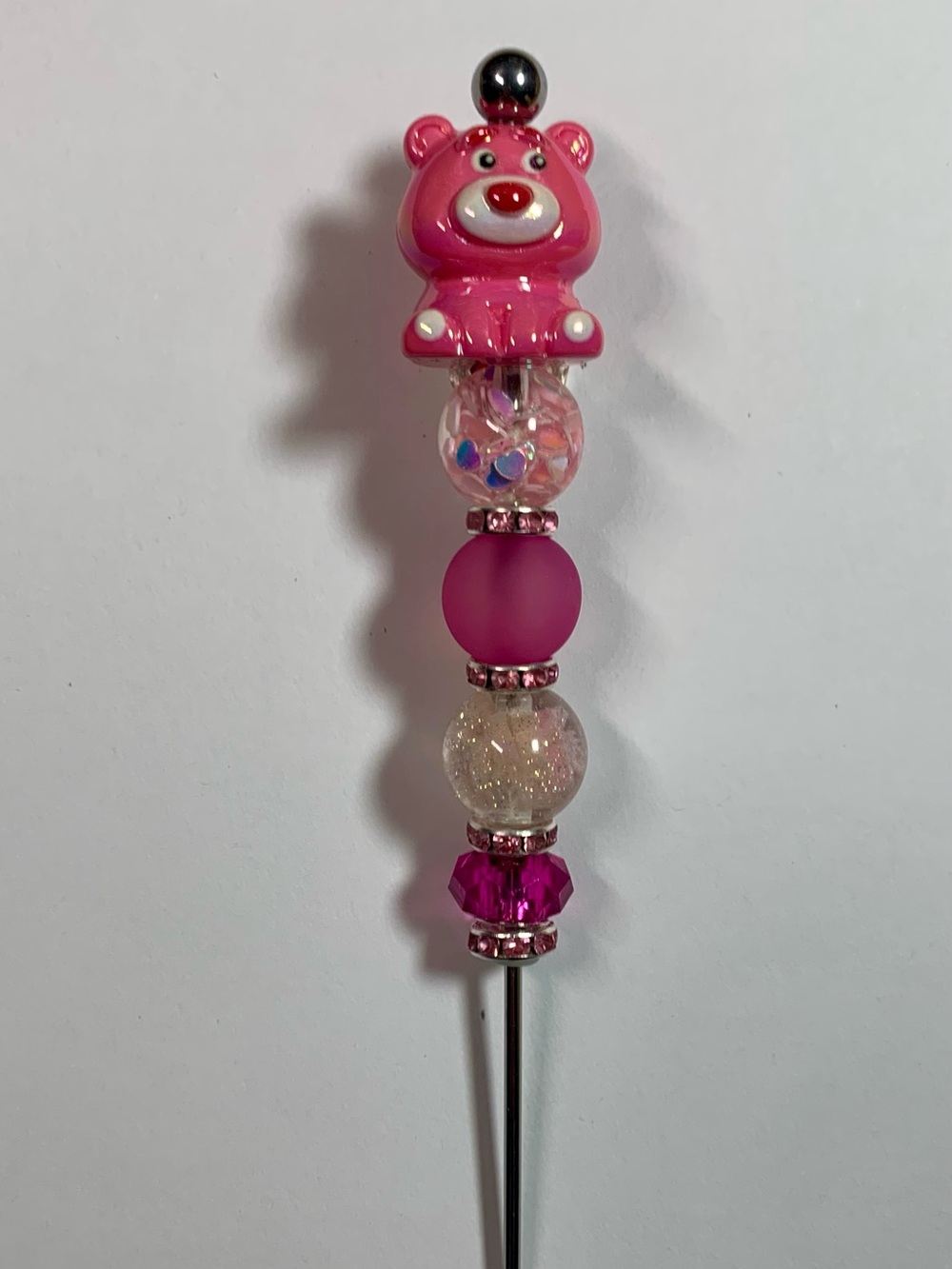 Pink Pokey tool with pink bear